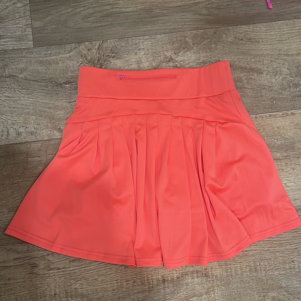 Coral tennis skirt